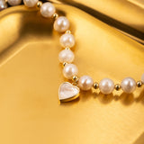 Elegant Pearl Bracelet with Gold-Tone Heart Charm