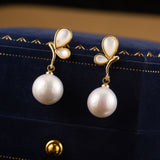 Pearl Drop Earrings with Whimsical Golden Petal