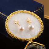 Pearl Drop Earrings with Whimsical Golden Petal