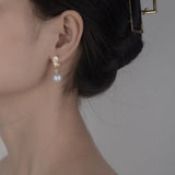 Pearl Drop Earrings with Whimsical Golden Petal